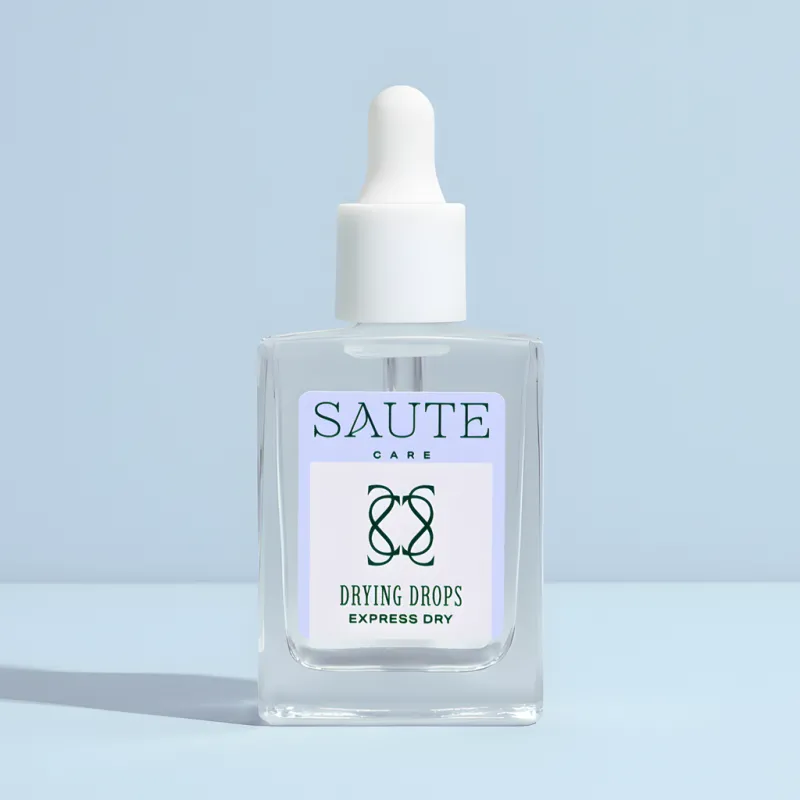 The text is already in English:
**Saute Care Drying Drops, 15 ml** — Photo 2